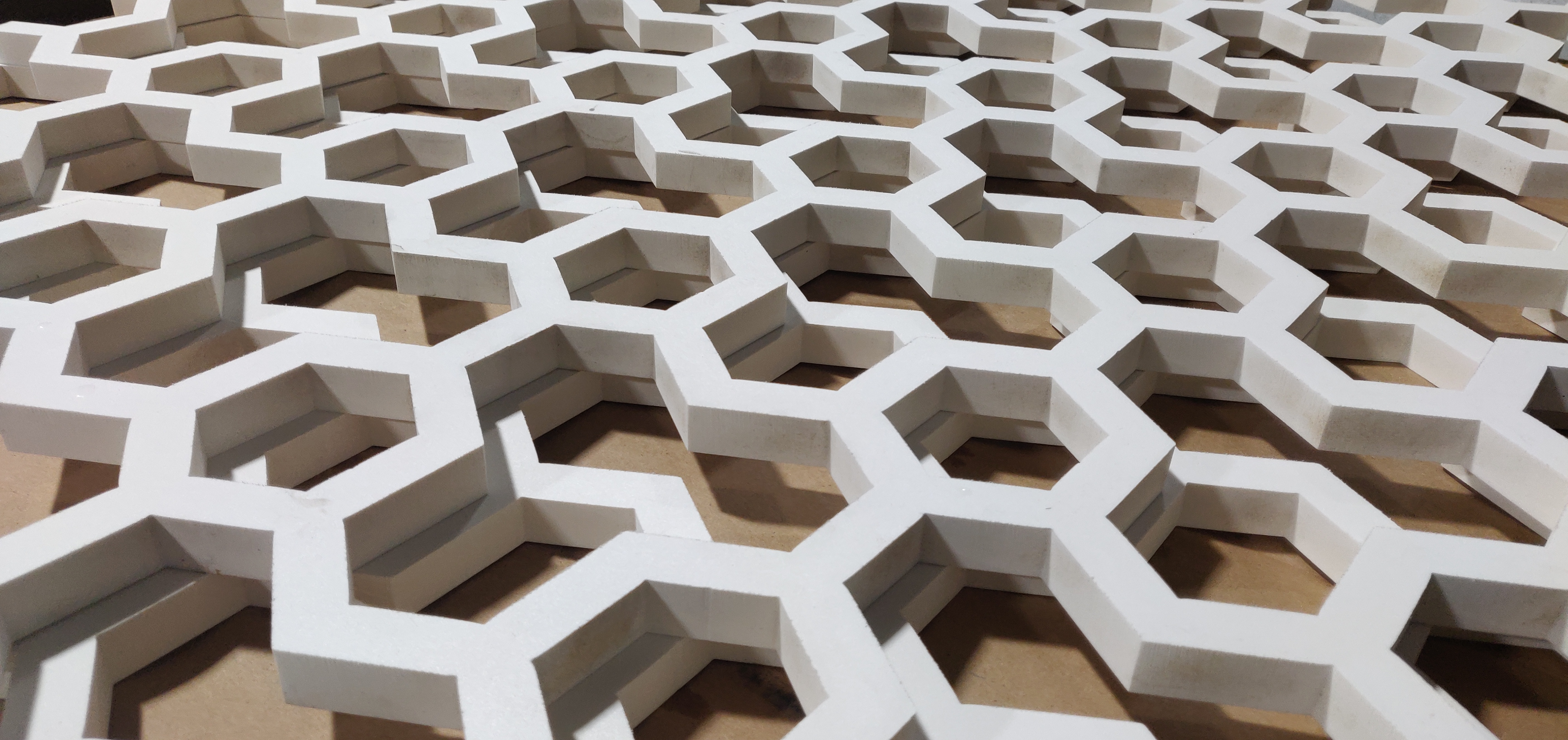 Waterjet-cut geometric lattice pattern by Advanced Waterjet & Laser